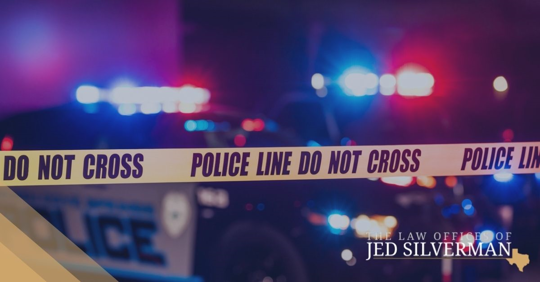 Police tape and police cars